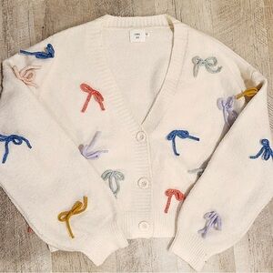 Luna Ivy cream multi bow cropped cardigan. Size Large. Fun and Pretty